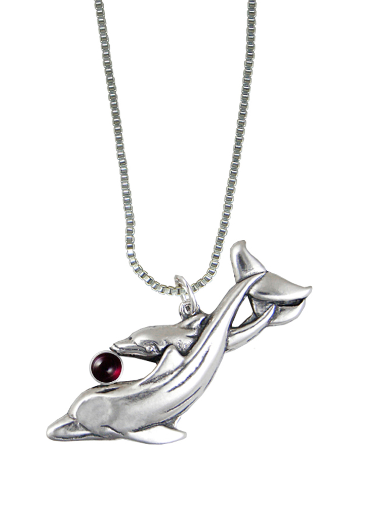 Sterling Silver Playful Dolphins Pendant With Garnet